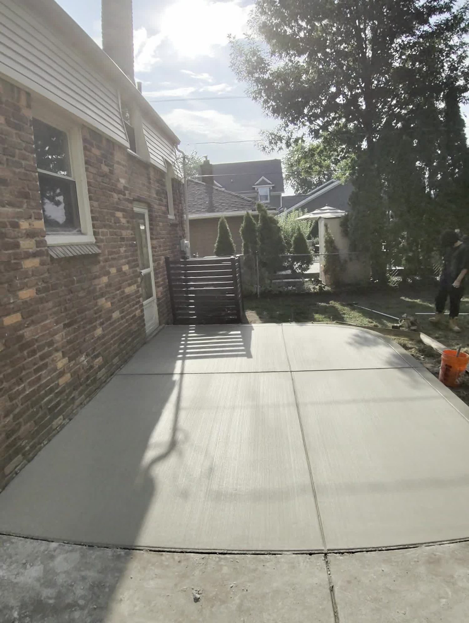 Finished custom concrete patio with decorative edge in Berkley MI