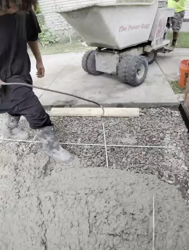 Concrete pour and edge work against the house in Berkley MI