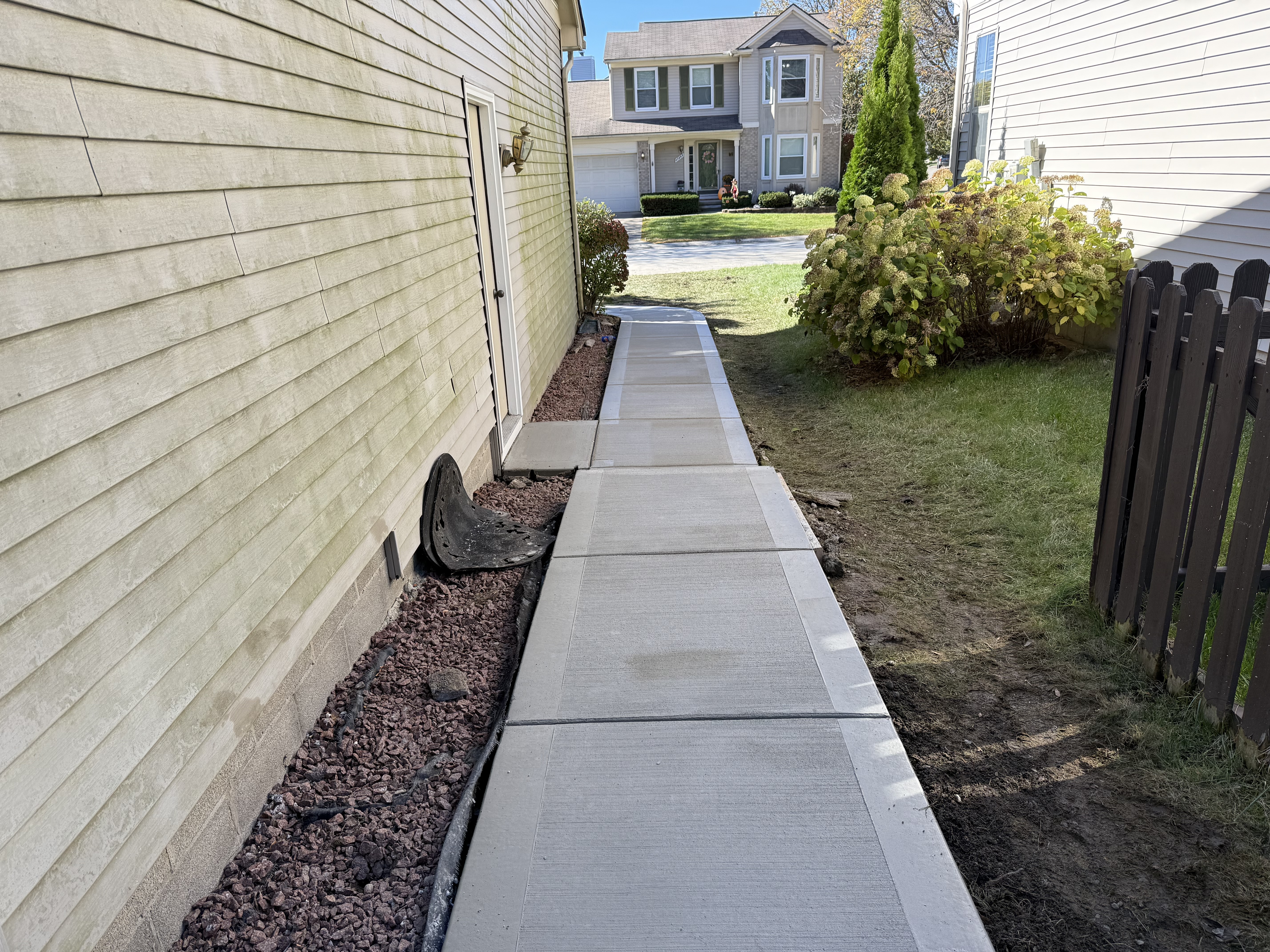 Concrete steps and walkway project by Mitten Made Concrete